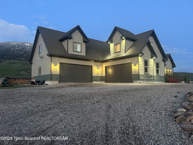 61 Astorian Ln, Smoot, WY 83126 - view of front of home featuring driveway and a garage