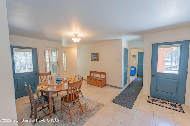 4515 Weslin Trl, Island Park, ID 83429 - dining area featuring light tile patterned floors and baseboards