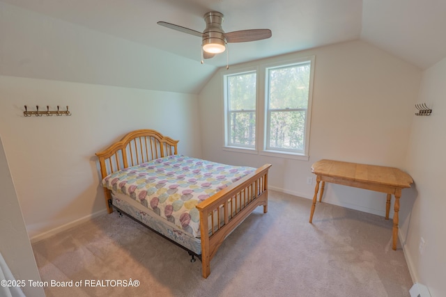 4515 Weslin Trl, Island Park, ID 83429 - carpeted bedroom featuring lofted ceiling, baseboard heating, baseboards, and a ceiling fan