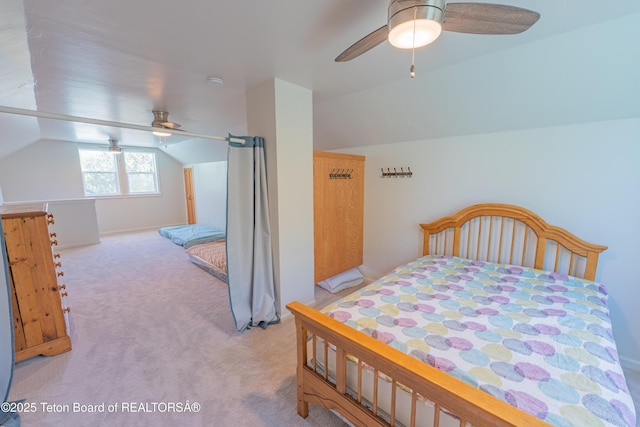 4515 Weslin Trl, Island Park, ID 83429 - bedroom featuring lofted ceiling, light colored carpet, and a ceiling fan