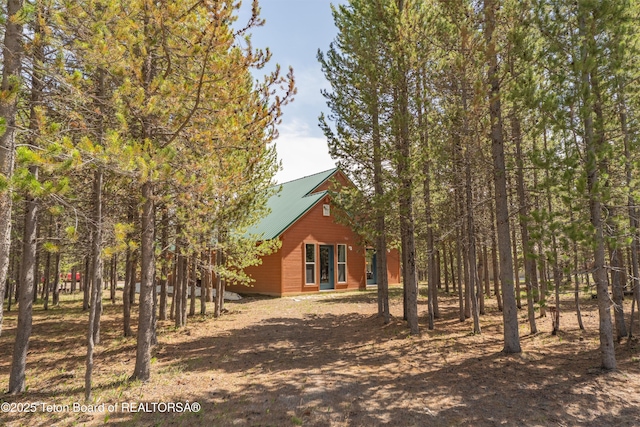 4515 Weslin Trl, Island Park, ID 83429 - view of side of home featuring metal roof