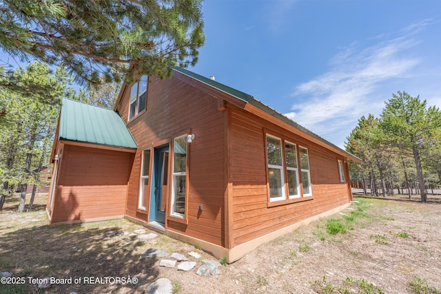 4515 Weslin Trl, Island Park, ID 83429 - view of home's exterior with metal roof