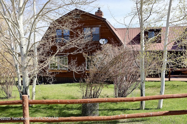 31 Cutoff Rd, Daniel, WY 83115 - view of front of house with a chimney and metal roof