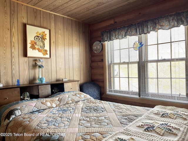 31 Cutoff Rd, Daniel, WY 83115 - bedroom featuring wood ceiling, multiple windows, and wooden walls