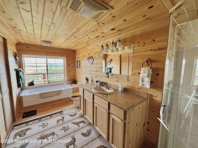 31 Cutoff Rd, Daniel, WY 83115 - full bathroom with wooden ceiling, vanity, a garden tub, toilet, and wood walls