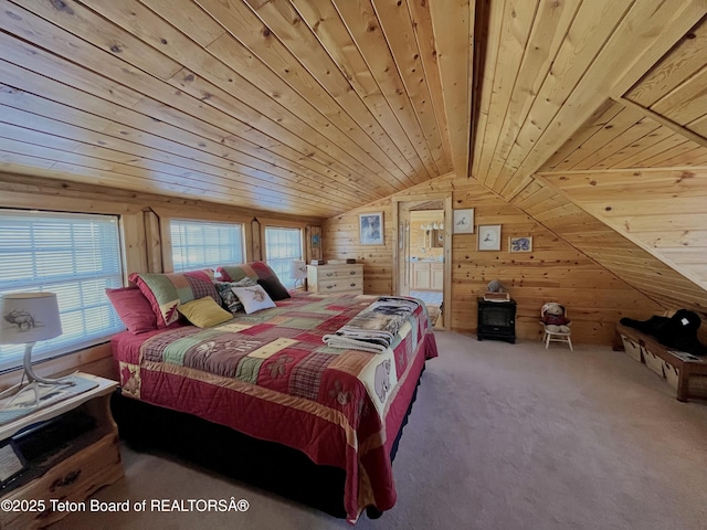 31 Cutoff Rd, Daniel, WY 83115 - carpeted bedroom with wooden ceiling, wood walls, vaulted ceiling, and ensuite bath