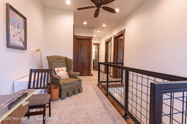 8494 Pronghorn Trl, Victor, ID 83455 - living area with recessed lighting, ceiling fan, and an upstairs landing