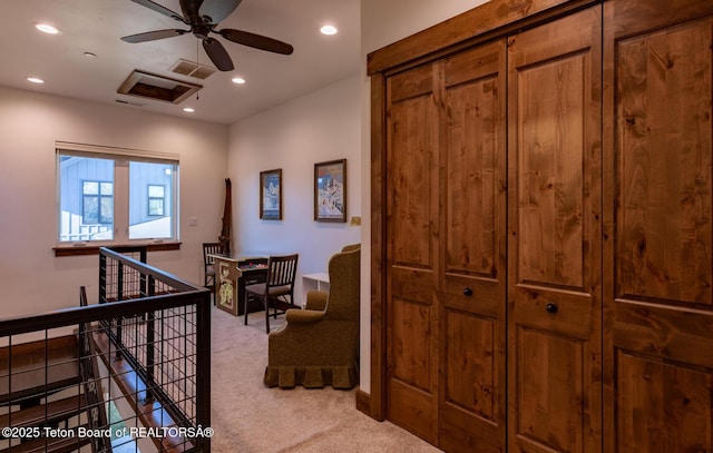 8494 Pronghorn Trl, Victor, ID 83455 - hallway with carpet floors, recessed lighting, and an upstairs landing