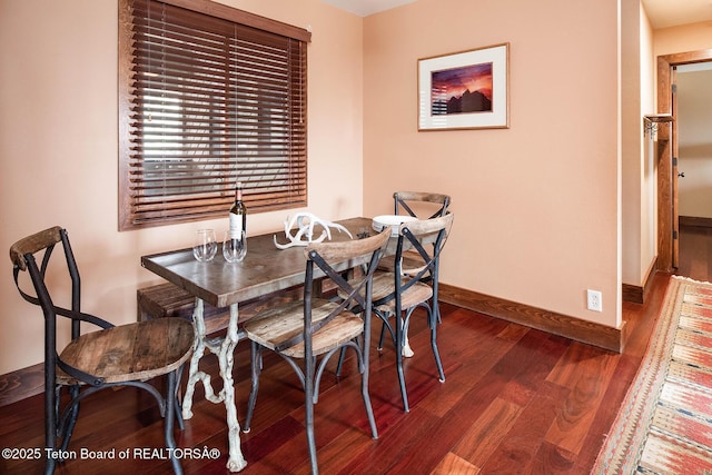 3670 W Michael Dr Unit E-21-E, Teton Village, WY 83025 - dining room featuring baseboards and wood finished floors