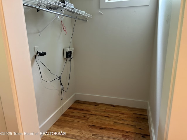 9064 Village Way, Victor, ID 83455 - laundry area with wood finished floors and baseboards