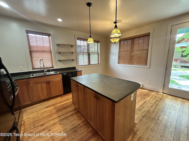 9064 Village Way, Victor, ID 83455 - kitchen with a sink, dark countertops, light wood-style floors, dishwasher, and a kitchen island