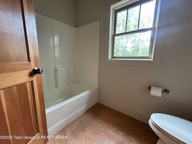 9064 Village Way, Victor, ID 83455 - full bath featuring toilet, shower / washtub combination, and baseboards