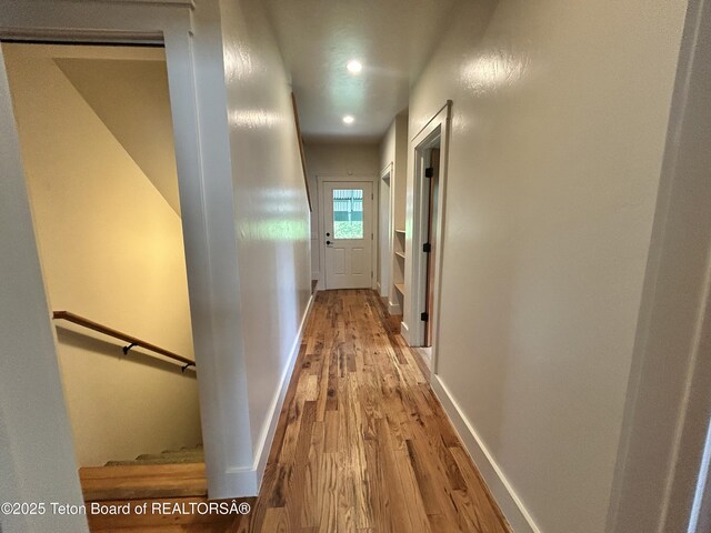9064 Village Way, Victor, ID 83455 - hallway featuring wood finished floors, baseboards, and recessed lighting