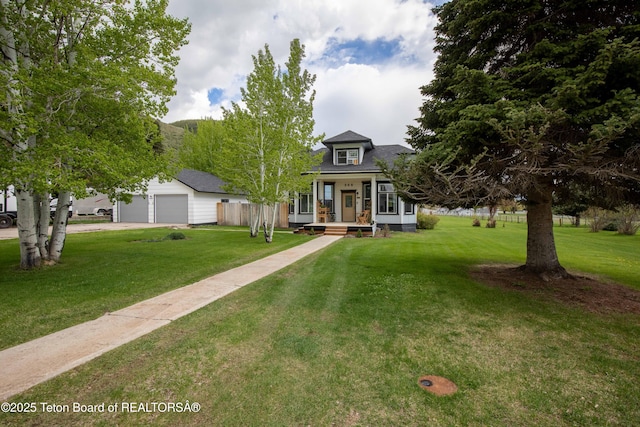 366 E 5th Ave, Afton, WY 83110 - view of front of house with a porch, a garage, and driveway
