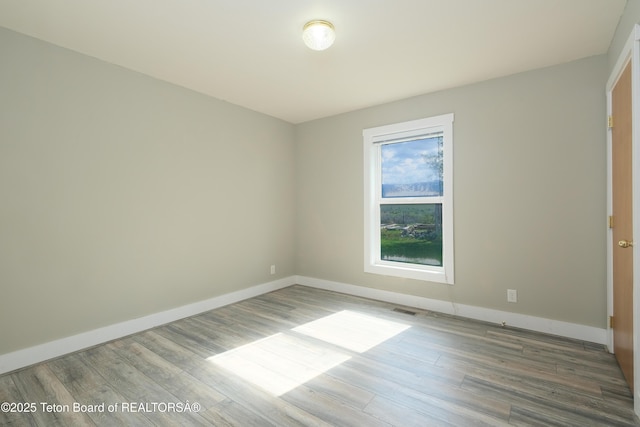 2697 Rendezvous Dr, Driggs, ID 83422 - unfurnished room featuring wood finished floors and baseboards