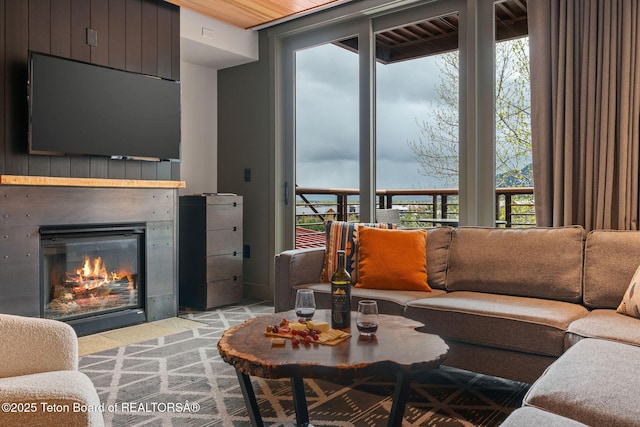 3335 W Villlage Dr Unit 201/203, Teton Village, WY 83025 - living room with plenty of natural light, a glass covered fireplace, and carpet