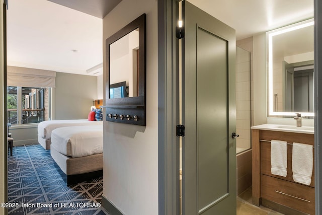 3335 W Villlage Dr Unit 201/203, Teton Village, WY 83025 - bedroom with a sink and dark flooring