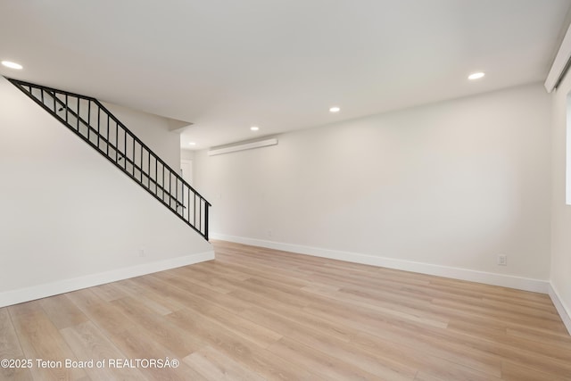 826 Powderhorn Ln Unit C, Jackson, WY 83001 - finished basement featuring stairs, recessed lighting, baseboards, and light wood-style floors
