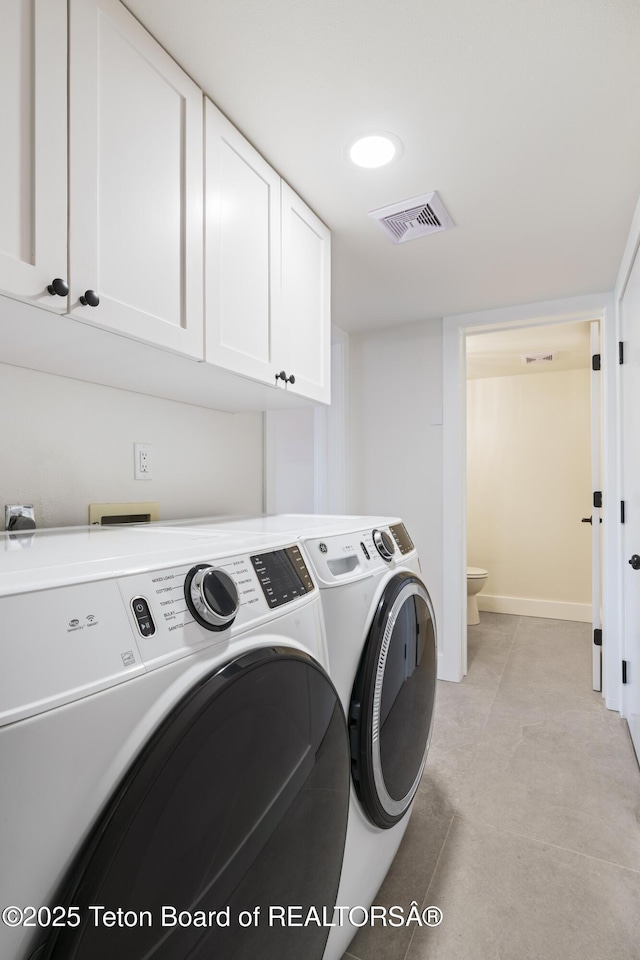 826 Powderhorn Ln Unit C, Jackson, WY 83001 - washroom with washing machine and dryer and cabinet space