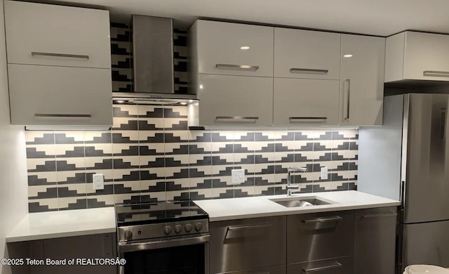 125 Pine Dr, Jackson, WY 83001 - kitchen featuring appliances with stainless steel finishes, modern cabinets, a sink, and light countertops