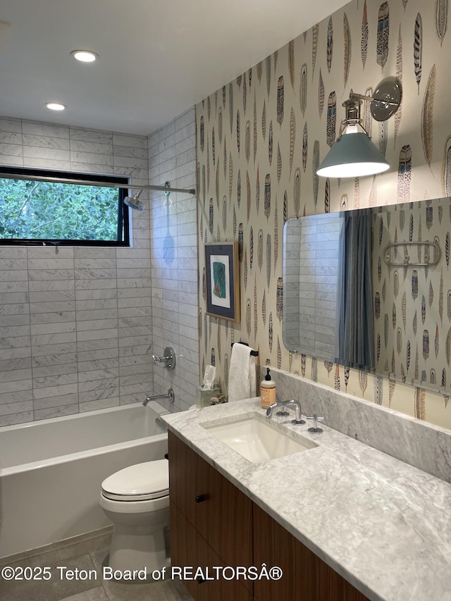125 Pine Dr, Jackson, WY 83001 - bathroom featuring toilet, tile patterned floors, shower / washtub combination, vanity, and recessed lighting