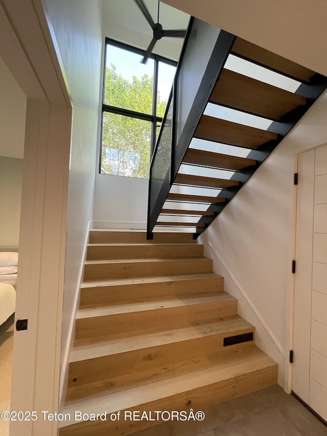 125 Pine Dr, Jackson, WY 83001 - stairs featuring tile patterned floors