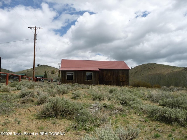 20 N Granier Ave, Lander, WY 82520 - view of side of property featuring metal roof and a mountain view