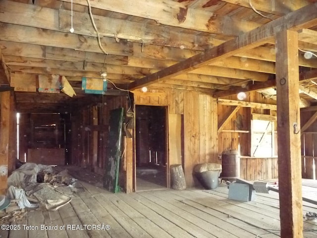 20 N Granier Ave, Lander, WY 82520 - miscellaneous room featuring hardwood / wood-style flooring and wooden walls