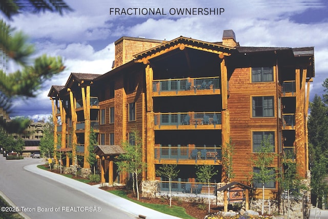3340 W Cody Ln Unit 111, Teton Village, WY 83025 - view of apartment building / complex