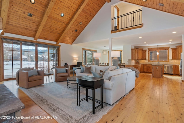 19 Moulton Ln, Victor, ID 83422 - living room with high vaulted ceiling, light wood-type flooring, wood ceiling with exposed beams, and recessed lighting