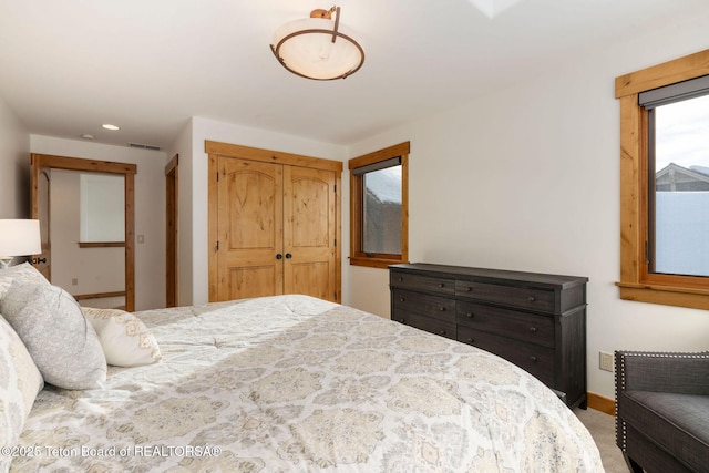 19 Moulton Ln, Victor, ID 83422 - bedroom with a closet, recessed lighting, carpet, and baseboards