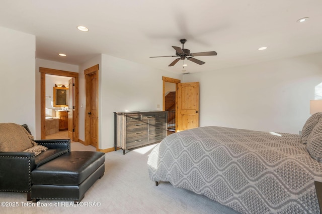 19 Moulton Ln, Victor, ID 83422 - bedroom featuring light carpet, recessed lighting, baseboards, ceiling fan, and connected bathroom