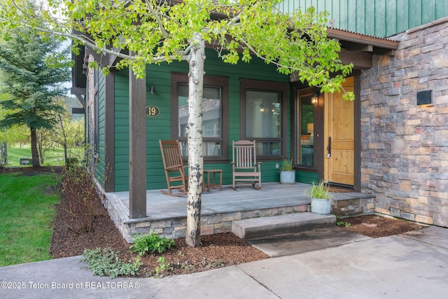 19 Moulton Ln, Victor, ID 83422 - doorway to property featuring a porch and stone siding