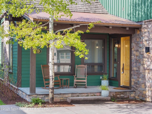 19 Moulton Ln, Victor, ID 83422 - property entrance featuring covered porch and stone siding