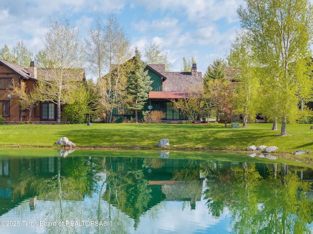 19 Moulton Ln, Victor, ID 83422 - view of property's community with a yard and a water view