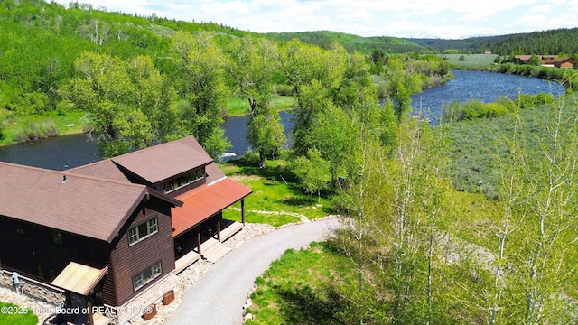 4641 N River Hollow Dr, Ashton, ID 83420 - aerial view of a nearby body of water and a forest