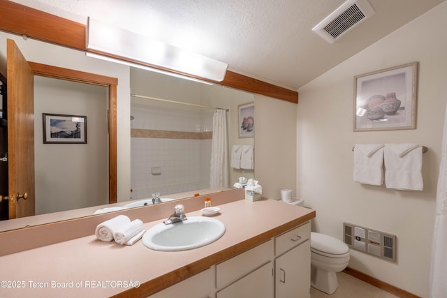3665 N Teton Dr Unit 623, Wilson, WY 83014 - bathroom with a shower with curtain, toilet, vanity, and vaulted ceiling