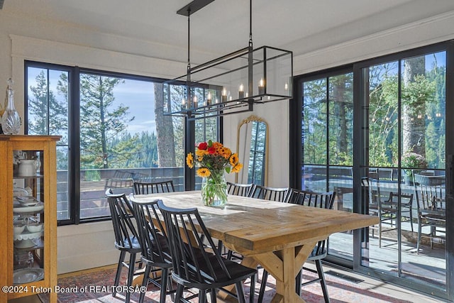 dining space featuring a chandelier