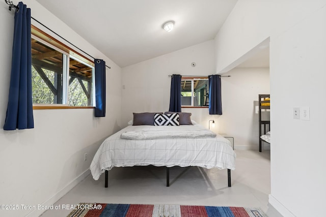 2077 Highland Way, Victor, ID 83455 - bedroom featuring vaulted ceiling and baseboards