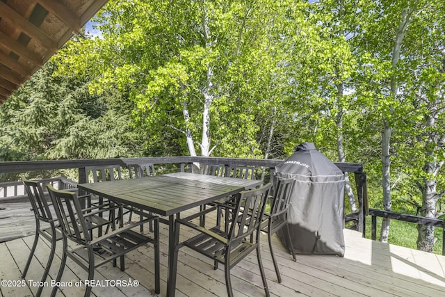 2077 Highland Way, Victor, ID 83455 - wooden terrace featuring outdoor dining space