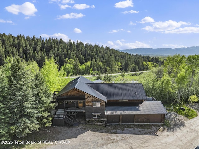 2077 Highland Way, Victor, ID 83455 - view of mountain backdrop with a forest