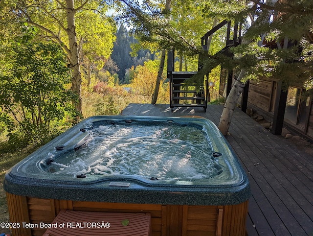 2077 Highland Way, Victor, ID 83455 - deck with stairway and a view of trees