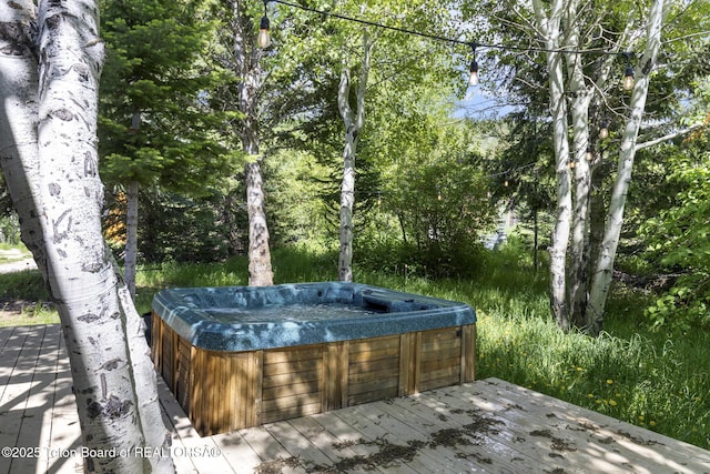 2077 Highland Way, Victor, ID 83455 - wooden terrace with a hot tub