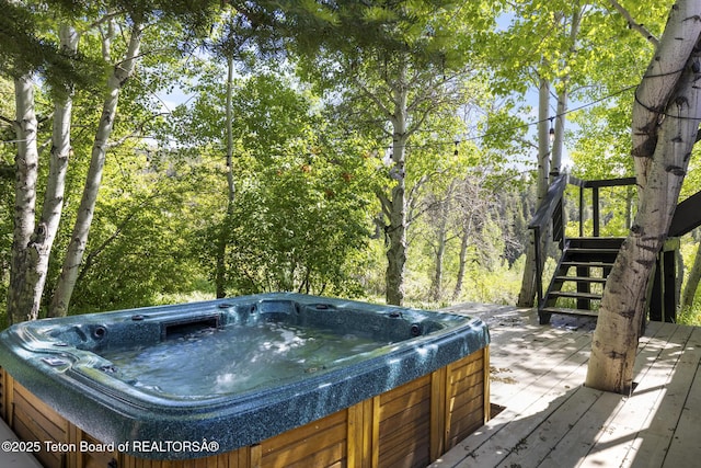 2077 Highland Way, Victor, ID 83455 - wooden terrace with a hot tub and stairway