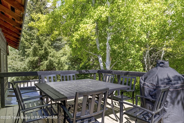 2077 Highland Way, Victor, ID 83455 - deck featuring outdoor dining space and a grill