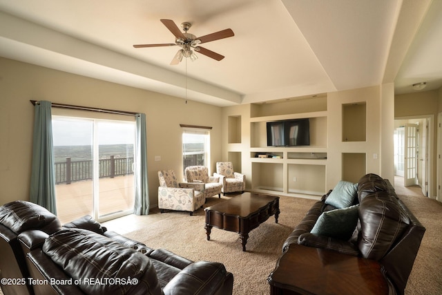 63 Iroquois Trl, Boulder, WY 82923 - carpeted living area featuring built in features, ceiling fan, and plenty of natural light