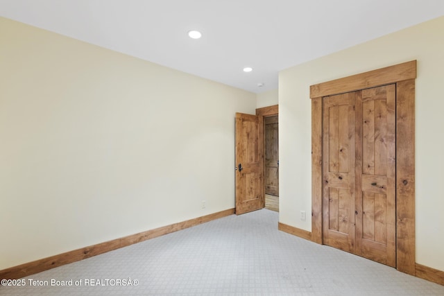 5725 W Caddis Fly Dr, Wilson, WY 83014 - unfurnished bedroom featuring carpet flooring and recessed lighting