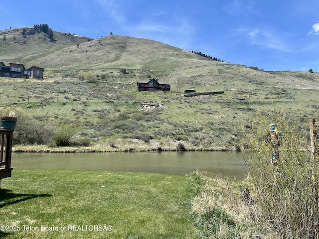 385 N Glenwood St, Jackson, WY 83001 - view of mountain backdrop with a large body of water