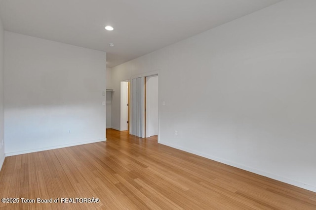 668 S Millward St, Jackson, WY 83001 - spare room featuring light wood finished floors, baseboards, and recessed lighting