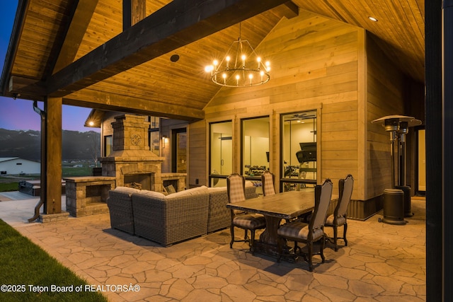 2399 Chapel Rd, Swan Valley, ID 83449 - view of patio / terrace with an outdoor living space with a fireplace